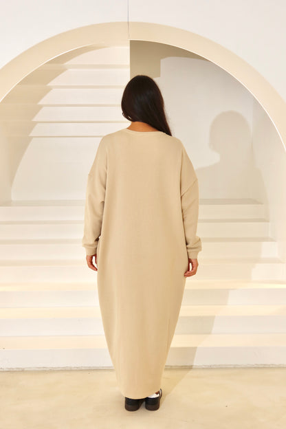 ANĀQA JUMPER DRESS - SAND