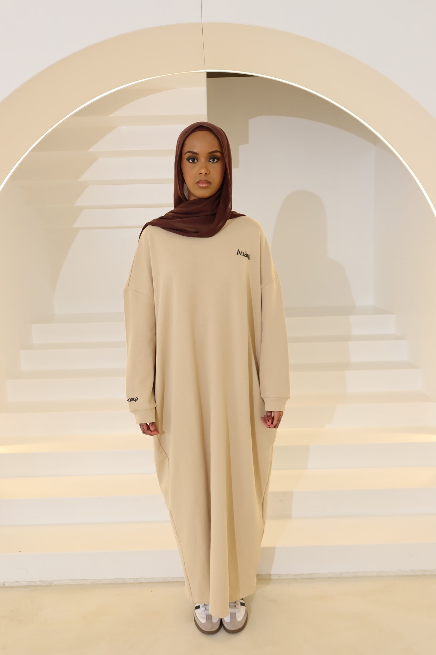 ANĀQA JUMPER DRESS - SAND